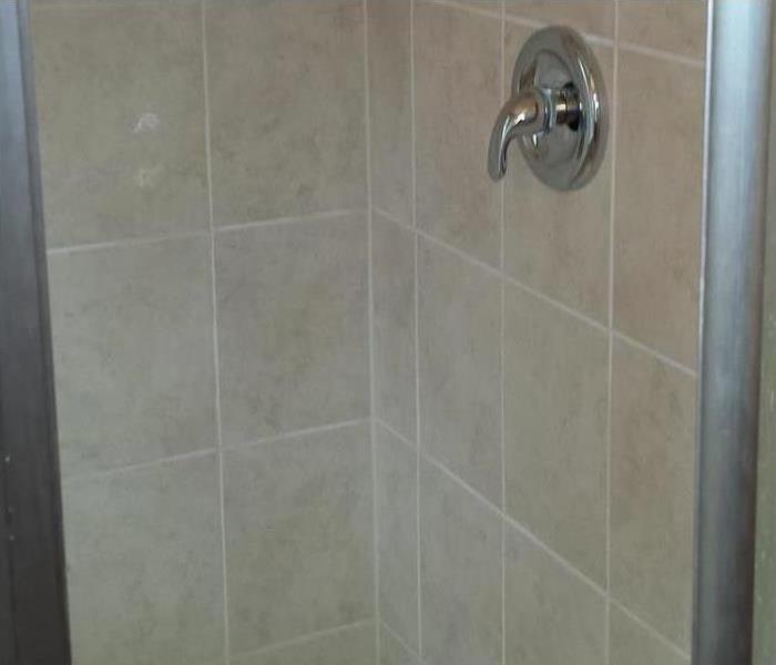 Shower stall showing new tile installed